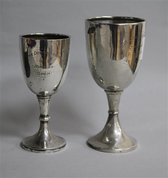 Two small silver presentation trophy cups, tallest 14.4cm.